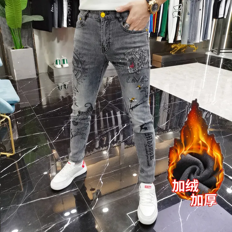 欧洲站加绒加厚牛仔裤新款男款潮牌印花烫钻个性时尚修身小脚裤