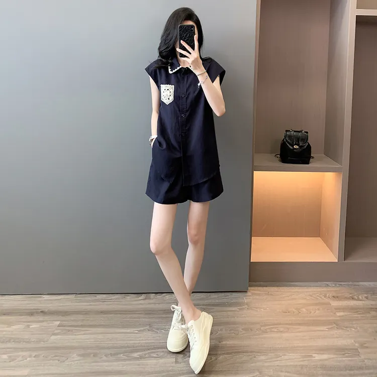 欧货时尚气质减龄套装女夏款遮肉显瘦刺绣无袖衬衫阔腿短裤两件套