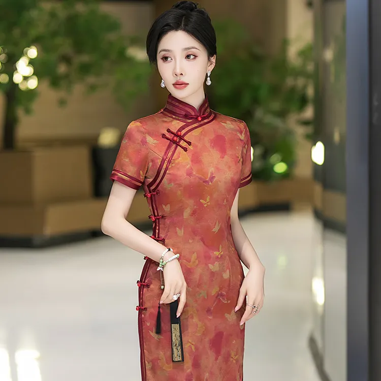 新中式旗袍高端2025夏季老上海素雅国风礼服改良桔色日常可穿裙子