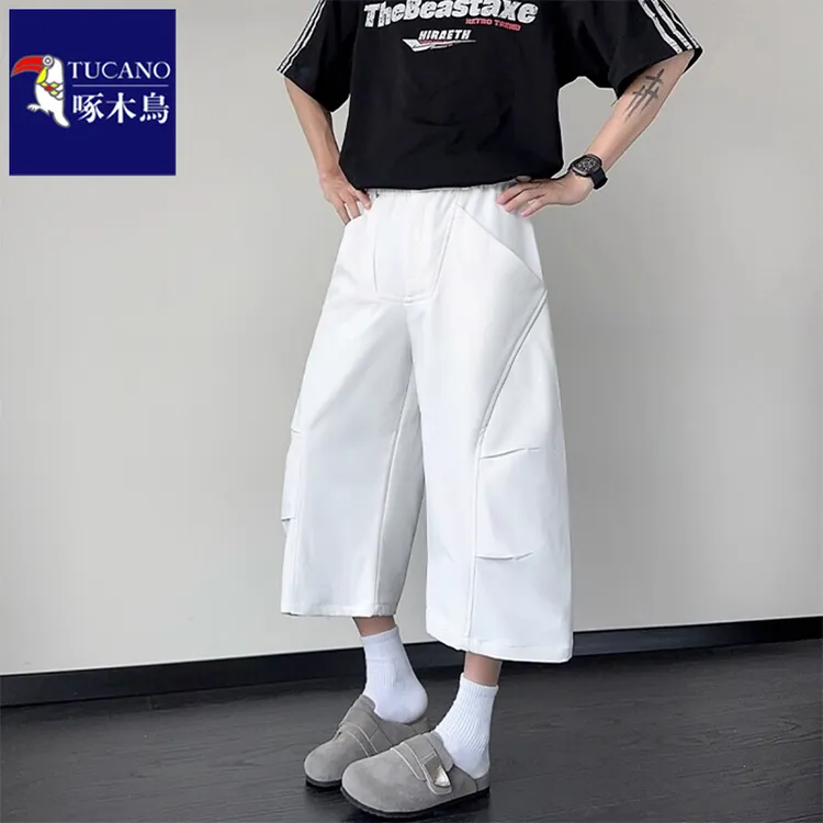 啄木鸟褶皱弧形设计感白色七分裤男夏季加肥大码宽松直筒弯刀短裤
