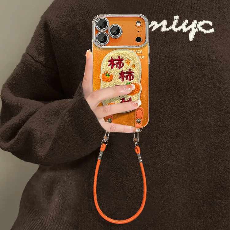 网红同款适用iphone17promax手机壳15毛绒柿柿顺利贴件挂绳16中国