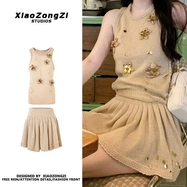 两件套女新款小众立体花朵显瘦针织背心休闲高腰百褶a字短裙套装