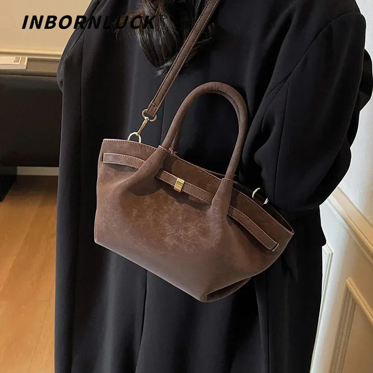 麂皮绒包包女大容量2025秋冬季新款时尚复古斜挎包手提通勤水桶包