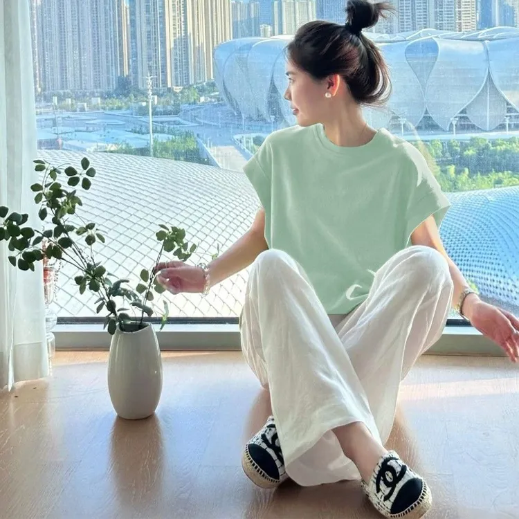 青柠绿色圆领宽松短袖T恤女新款夏季多巴胺穿搭温柔修身显瘦上衣