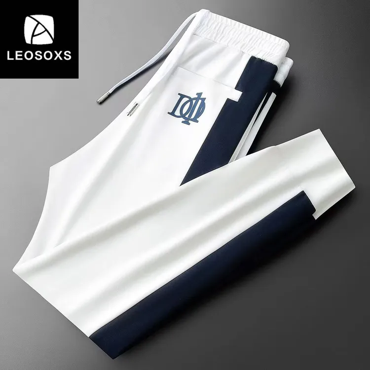 夏季薄款高端时尚潮流拼接冰丝休闲裤男士修身运动小脚卫裤男款