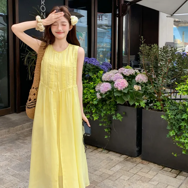 黄色无袖背心连衣裙女2025夏季新款法式减龄温柔风多巴胺度假长裙