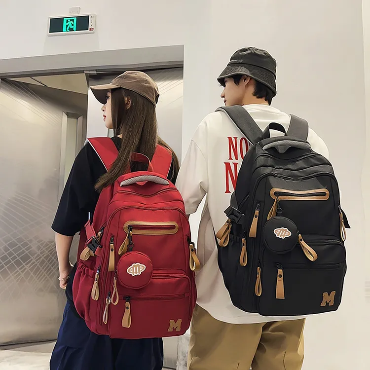 大容量纯色双肩包高中生轻便书包百搭初中生男女减负护脊气垫背包