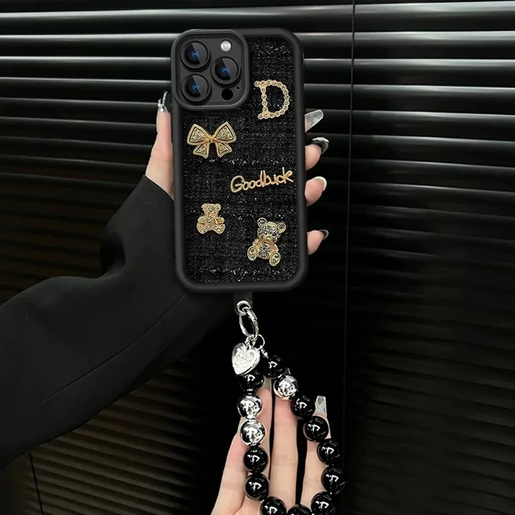 欧克里里蝴蝶结小熊适用vivo华为oppo小米苹果16/15promax针织壳