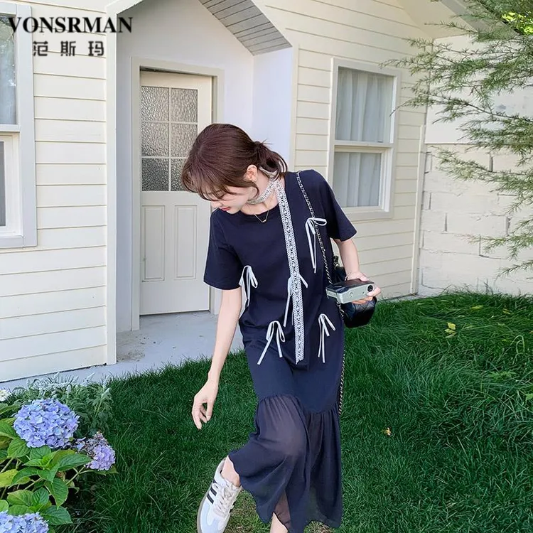 藏青色超好看蝴蝶结绑带连衣裙女夏季2025年新款浪漫风拼接大摆裙