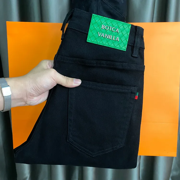 DeweLvum新款男休闲百搭纯黑色时尚九分牛仔裤男修身小脚牛仔长裤