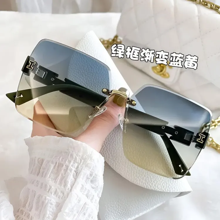 无框太阳镜女士高级感轻奢太阳眼镜女款防紫外线开车墨镜大框圆脸