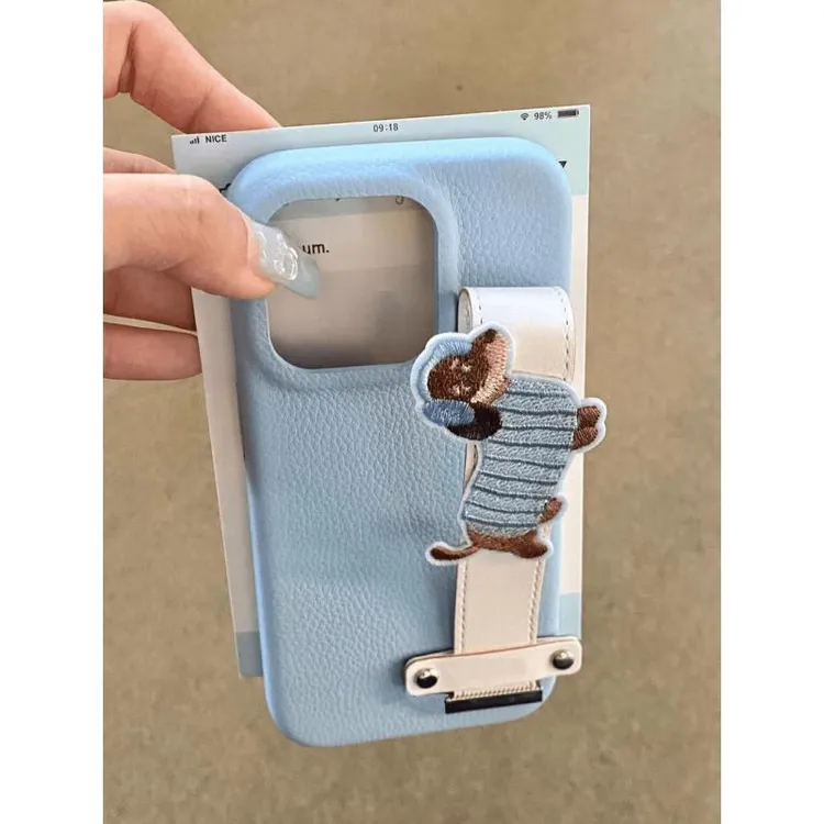 欧克里里腊肠狗腕带皮纹适用iPhone16肤感苹果15/14华为P70手机壳