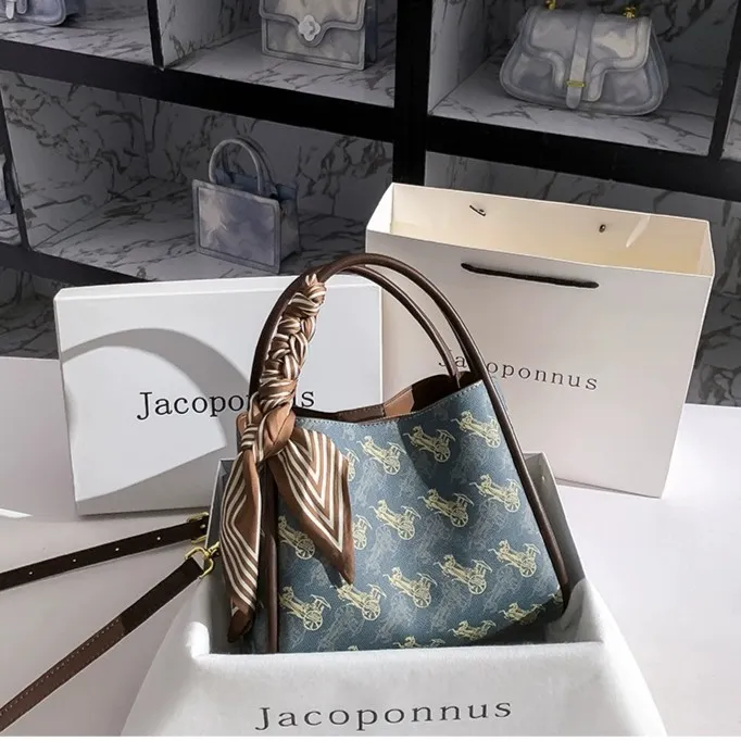 【雅各邦】真皮水桶包女手提2025新款爆款流行百搭通勤菜篮子包包女