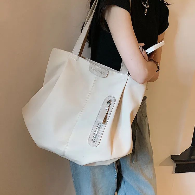 佐猫大容量帆布包包女款爆款2025新款单肩包大学生上课通勤托特包