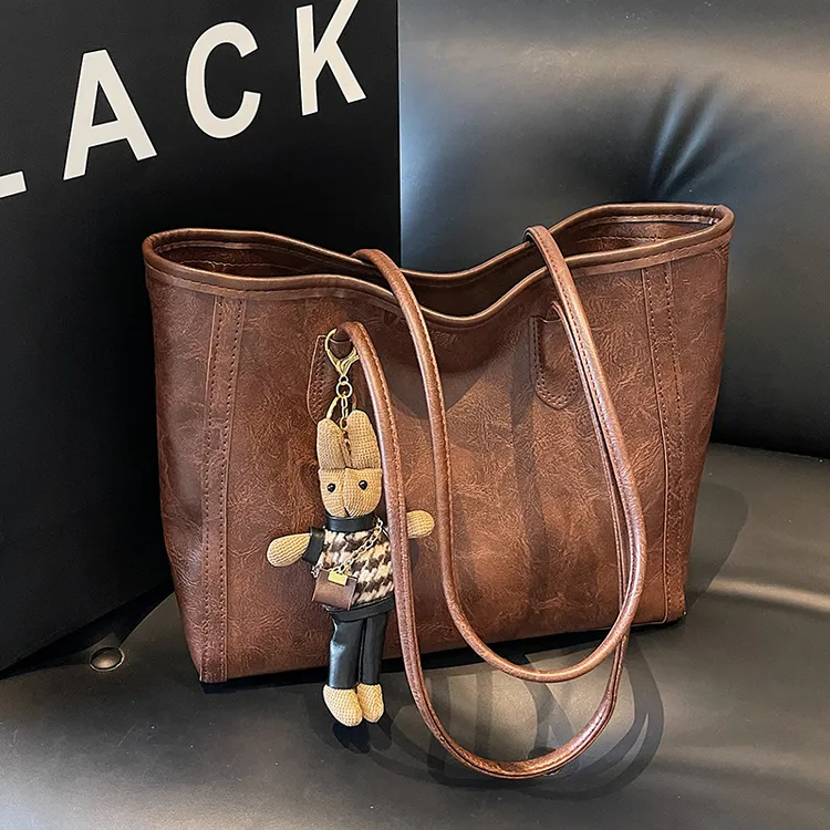 佐猫包包女2025新款包包托特包高级感小众单肩包时尚百搭通勤大包