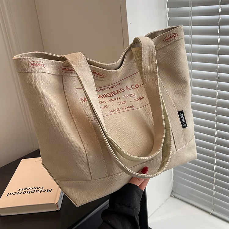 佐猫帆布包包女款爆款2025新款大容量手提袋通勤包百搭单肩托特包