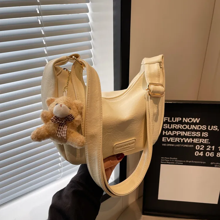 佐猫女士包包2025春夏新款饺子包时尚百搭单肩包高级感休闲斜挎包