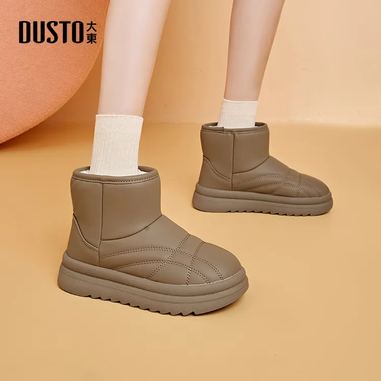 大东靴子2025冬季纯色圆头保暖加绒厚底休闲短靴防滑雪地靴女7523