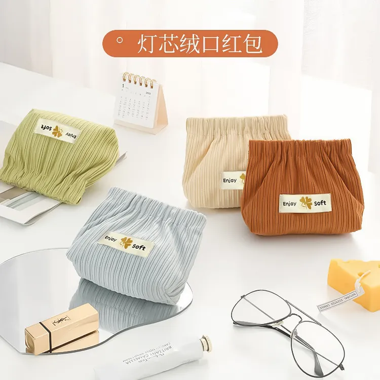 收纳袋收纳包包口红化妆品分类袋便携式弹片眼镜袋自动闭合束口袋