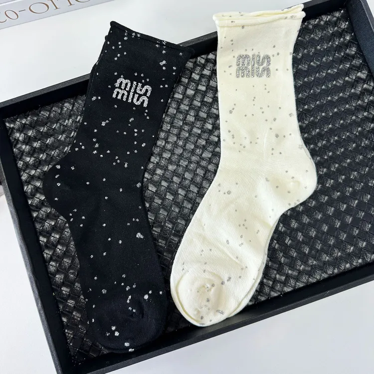 A1新品字母春夏女士薄款网眼透气卷边袜精梳棉欧货时尚中筒潮袜