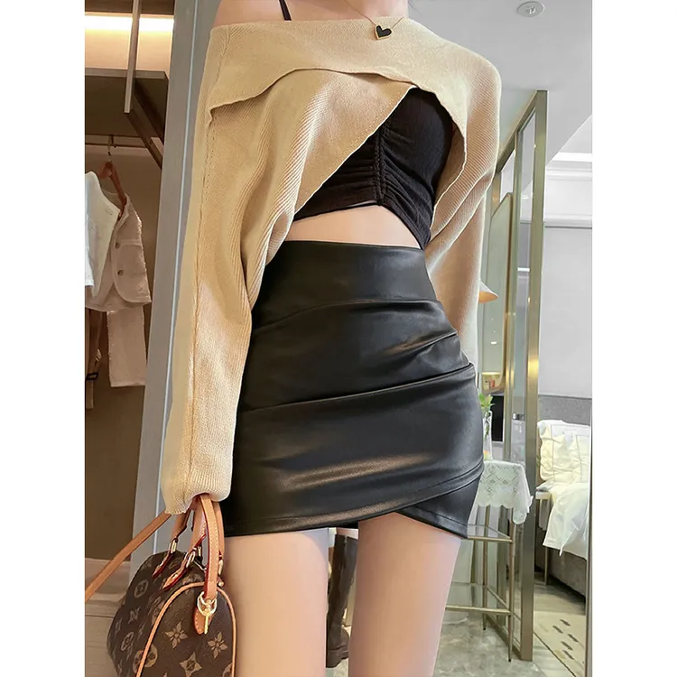 秋冬黑色辣妹性感包臀pu小皮裙女高腰显瘦交叉不规则紧身半身短裙
