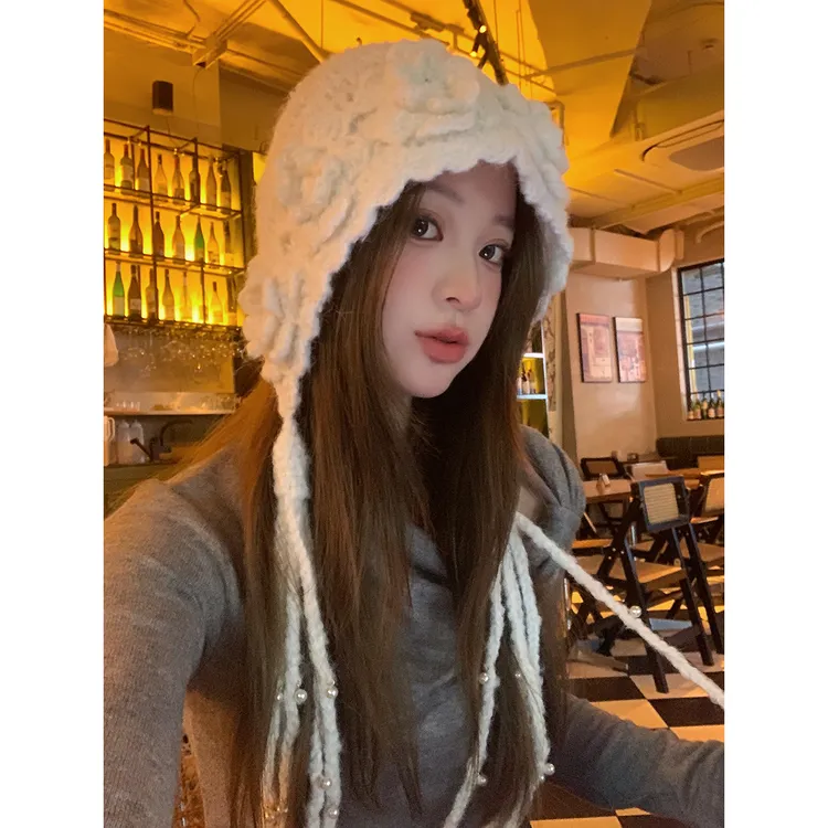 落雪白100纯手工帽子女冬2024新款羊毛流苏毛线帽绑带护耳雷锋帽