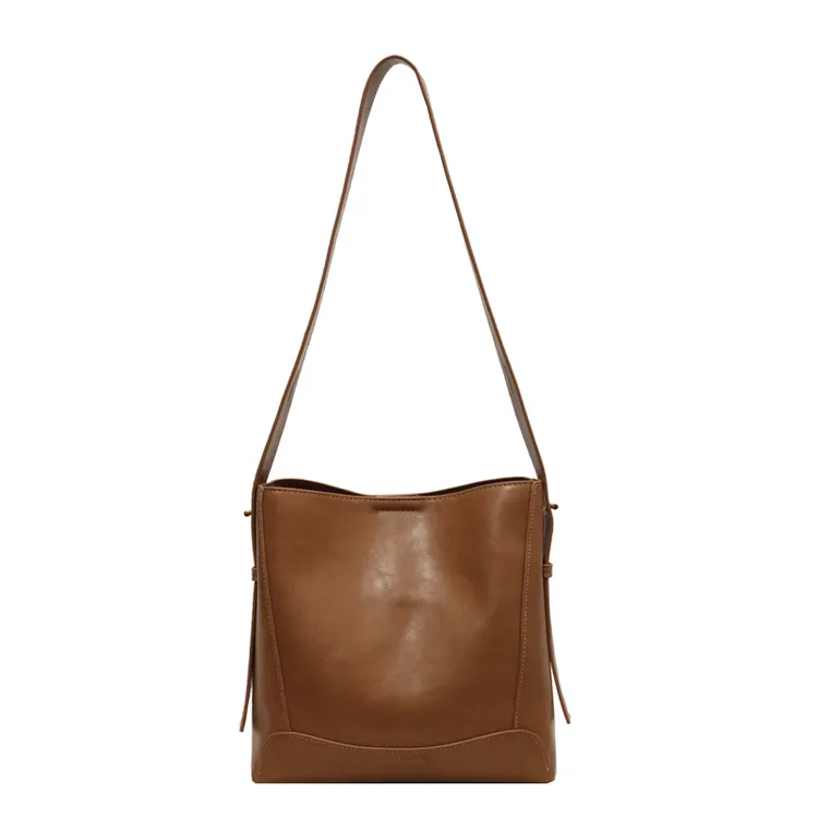 简约2024春夏小众设计托特包女士大容量拼接牛皮水桶包单肩斜挎包