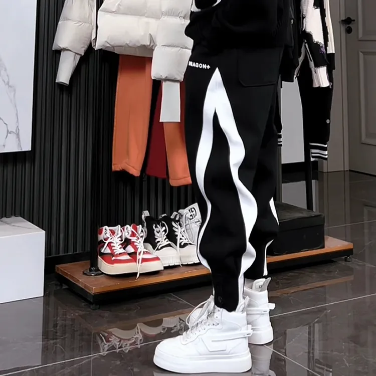 新款时尚哈伦裤男秋冬季宽松加厚高街休闲裤潮流脚口排扣束脚卫裤