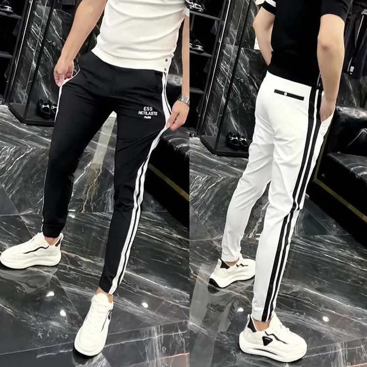 夏季薄款裤子男冰丝速干休闲裤侧边条纹韩版小脚裤百搭修身九分裤