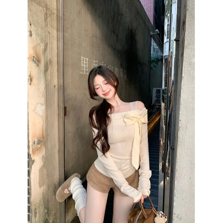 气质显瘦温柔风甜美一字领针织衫女装冬季小众蝴蝶结修身气质上衣