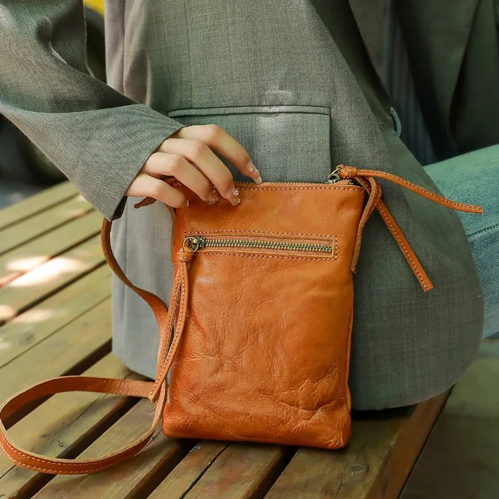 时尚真牛皮手机包真皮女包竖型小挎包复古放手机散步质感斜挎小包