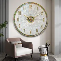 轻奢贝壳挂钟2024高级感创意简约时钟表挂墙高端新款客厅高档大气