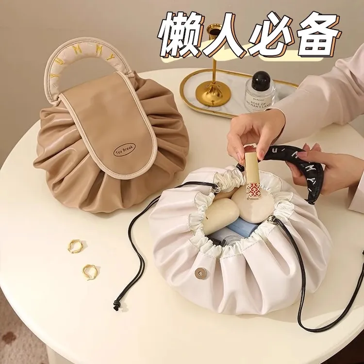 化妆包女大容量2024新款便携式懒人旅行收纳抽绳出差洗漱包一片式