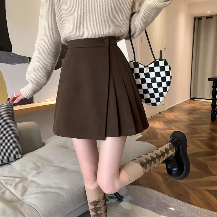 黑色毛呢半身裙女秋冬不规则短裙2025新款包臀裙高腰A字裙百褶裙