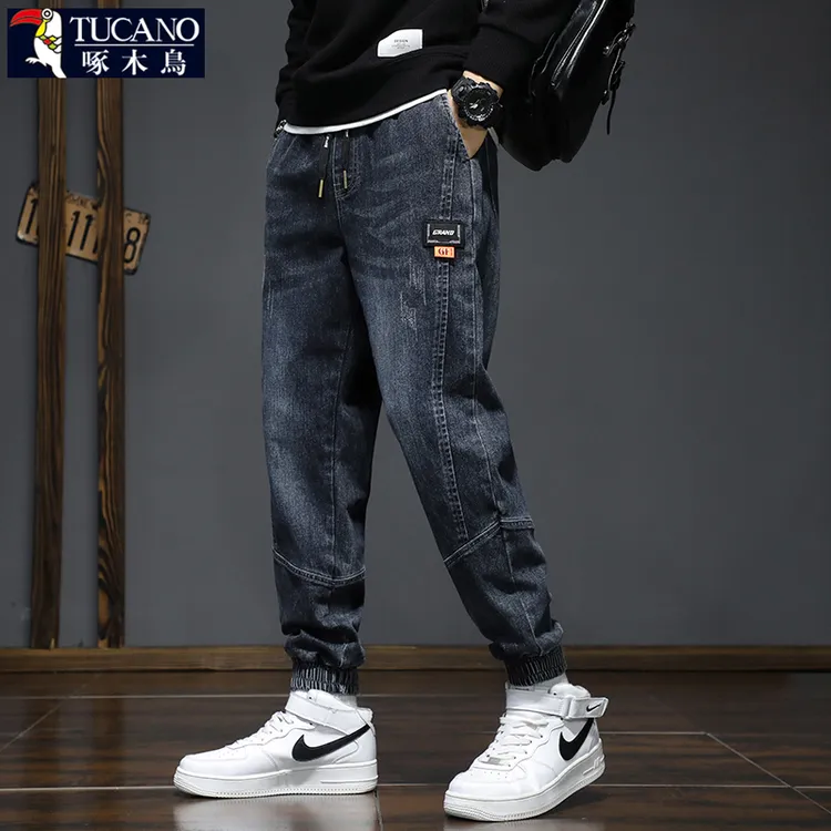 啄木鸟秋季束脚牛仔裤男士宽松工装秋冬款松紧腰弹力休闲长裤子男