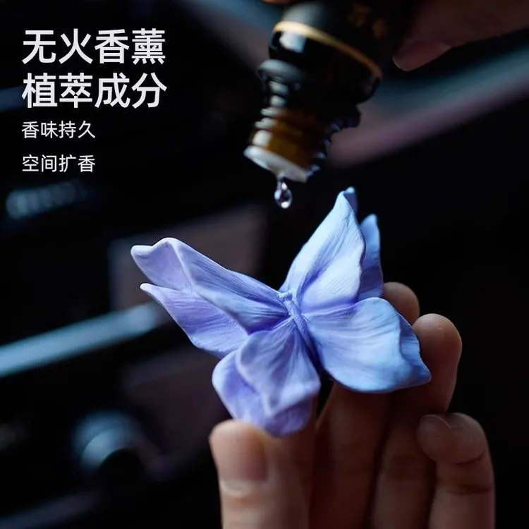 蝴蝶汽车载空调出风口香薰氛车用香水装饰摆件扩香石花朵车内饰品