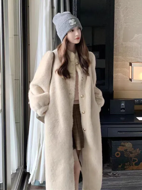 公主袖2025海宁冬季皮毛一体长款毛毛时尚外套宫廷风正肩大衣