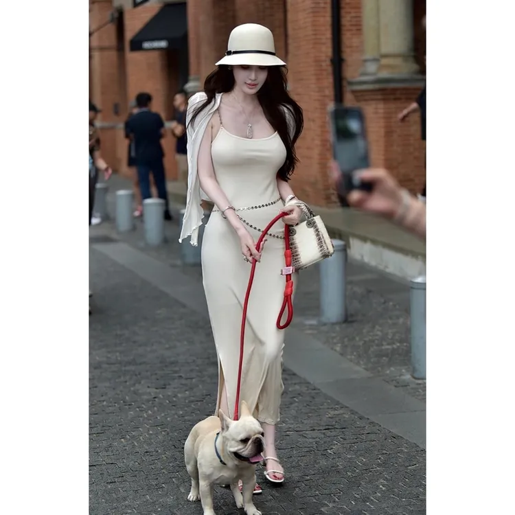 财阀千金秋装女2023年新款时尚套装优雅气质修身开衫吊带开叉长裙