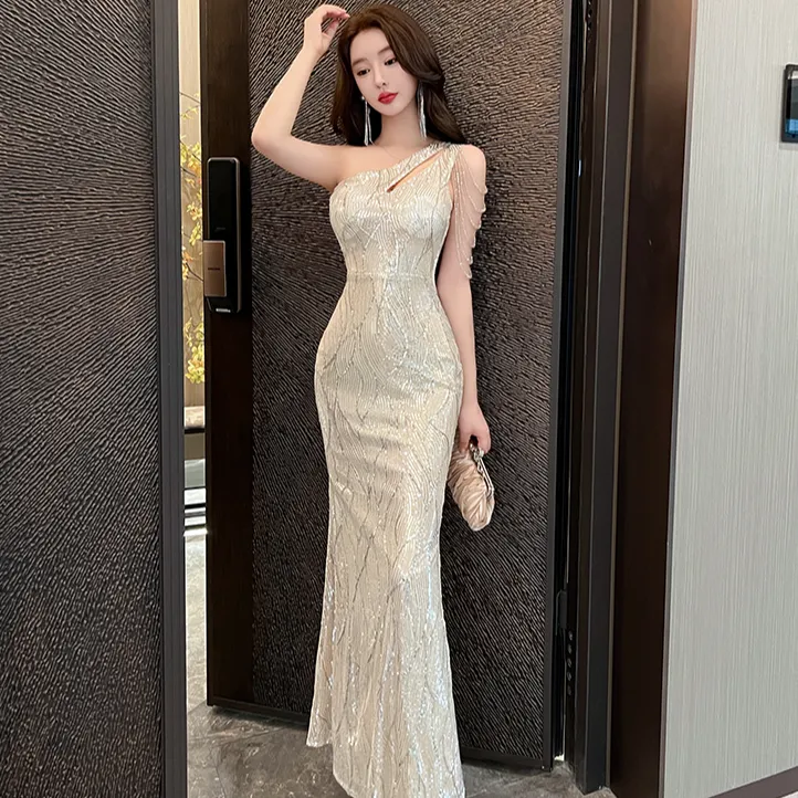 香槟银色气质亮片亮闪闪鱼尾不规则肩膀流苏长款宴会主持晚礼服裙