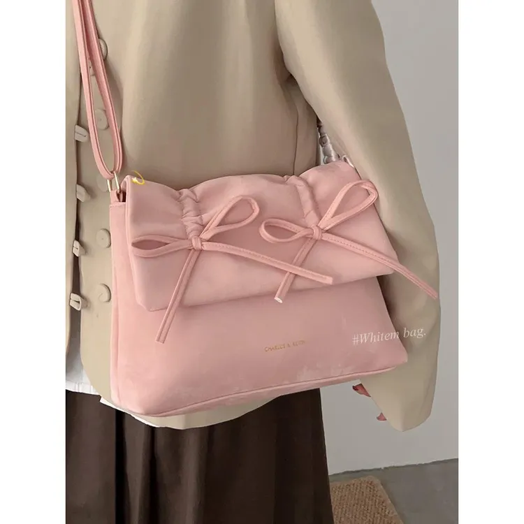 甜美蝴蝶结粉色包包女2025新款潮单肩斜挎包大容量通勤学生托特包
