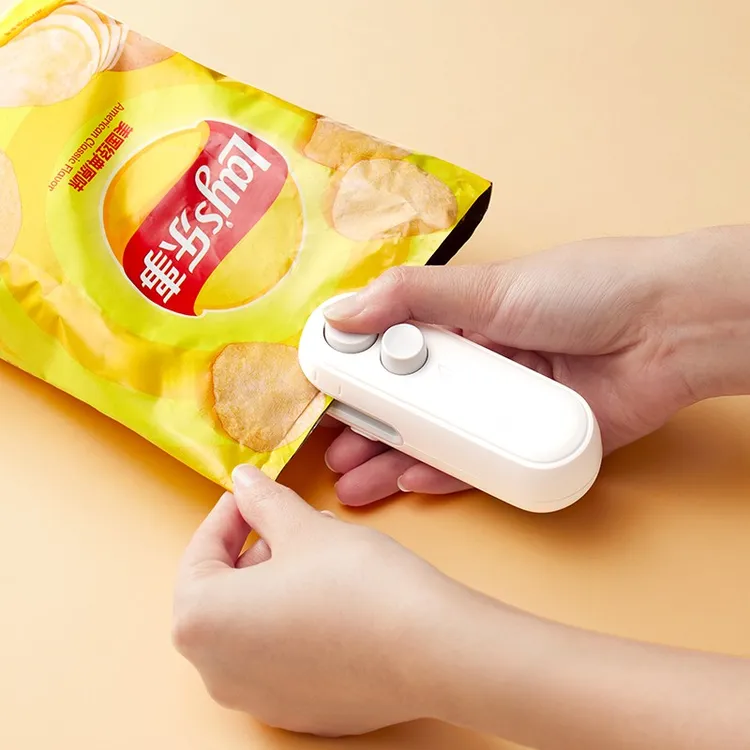 新款零食封口机小型迷你塑封机包装家用食品保鲜抽真空密封口神器