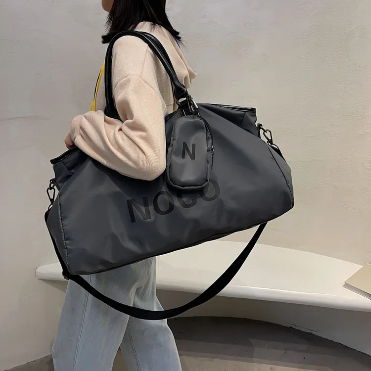 爆款收纳袋防水大容量旅行包手提行李袋登机包手提大包包健身包