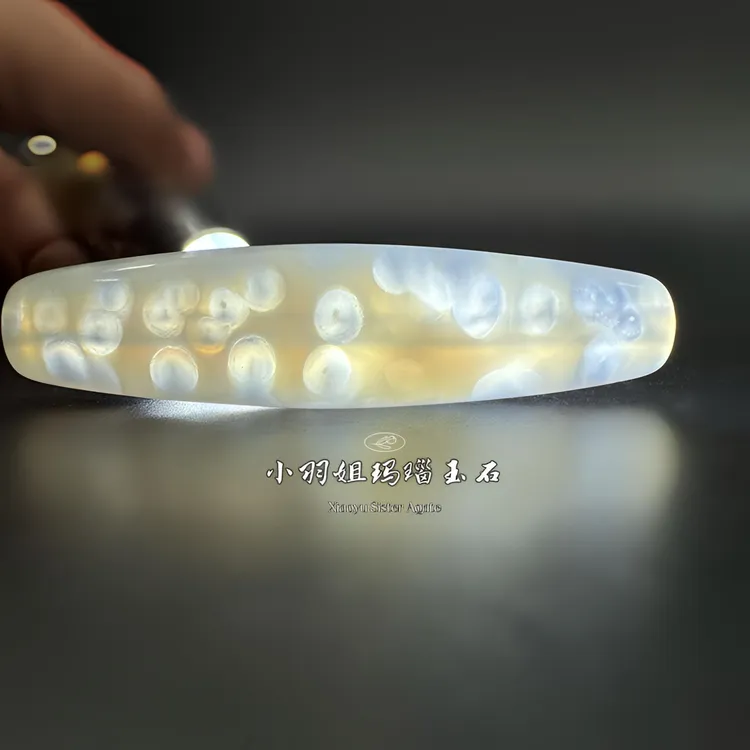天然缠丝玛瑙对透眼 千眼冰透勒子 尺寸57*14