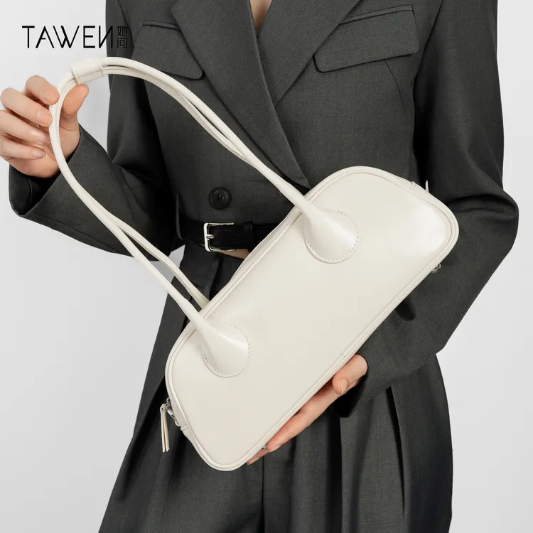 TAWEN她问原创 高级感小众单肩腋下包女大容量保龄球真皮法棍包