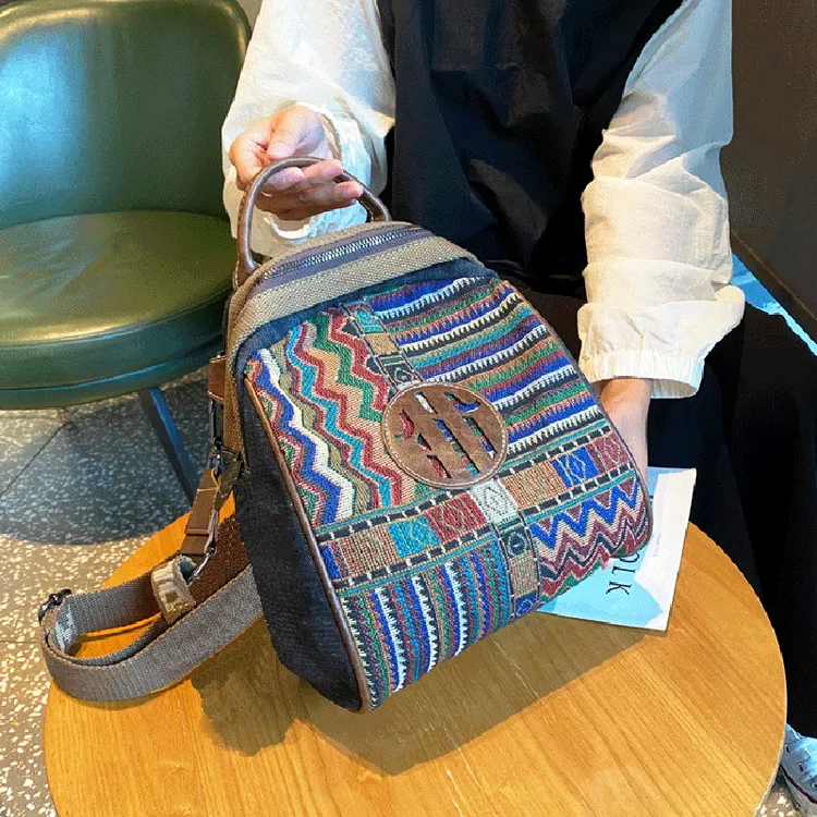 新款民族风牛仔布刺绣背包女包2025个性潮流帆布双肩包贝壳包三用