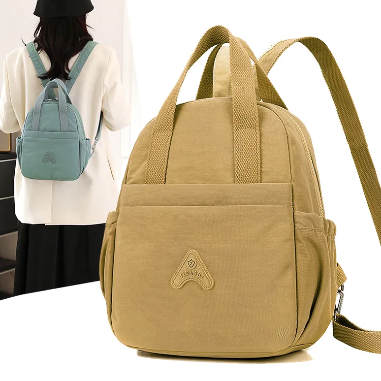 多功能帆布双肩包女2024新款时尚轻便胸包包百搭外出旅游小背包潮