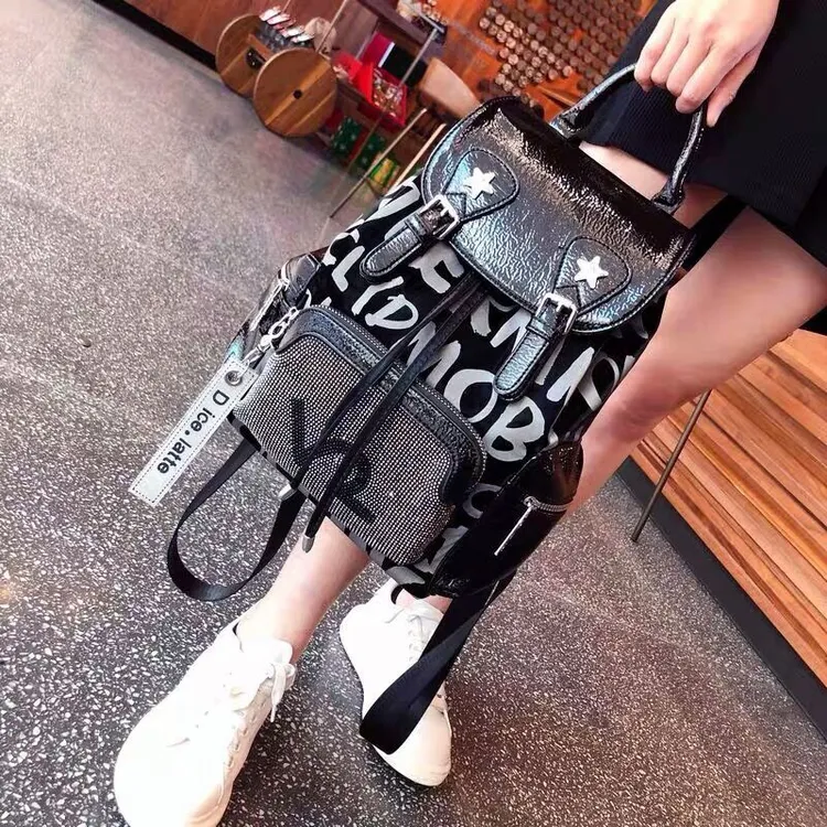新款2025时尚休闲大容量烫钻双肩包女士百搭洋气字母背包旅行包潮