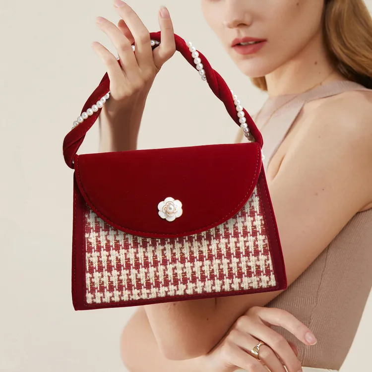 红色结婚包包女2025新款高级感小众婚包山茶花手提女包洋气新娘包