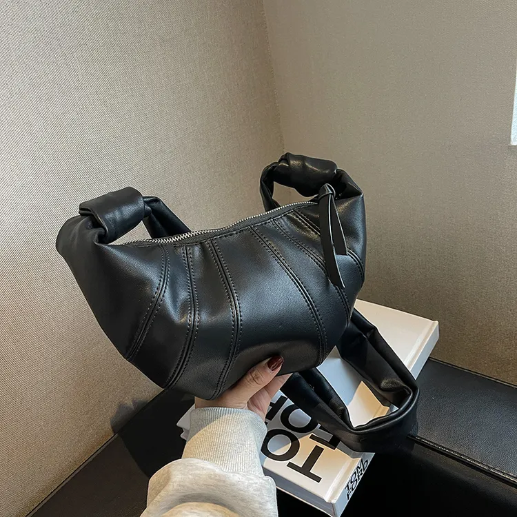 黑色包包女2025新款时尚饺子包月牙斜挎包小众高级感单肩包牛角包