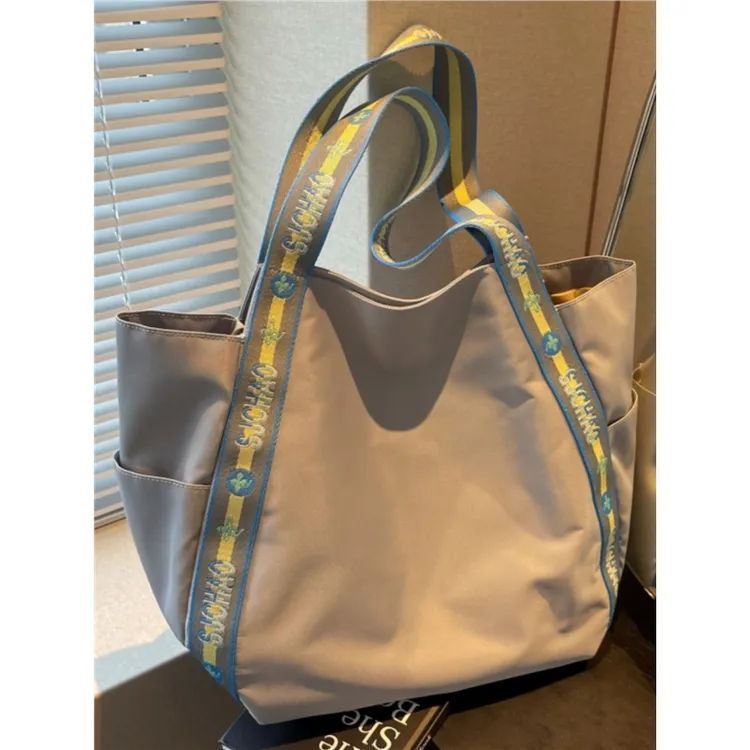 小众大容量包包女2024新款手提尼龙布购物袋外出通勤单肩托特大包